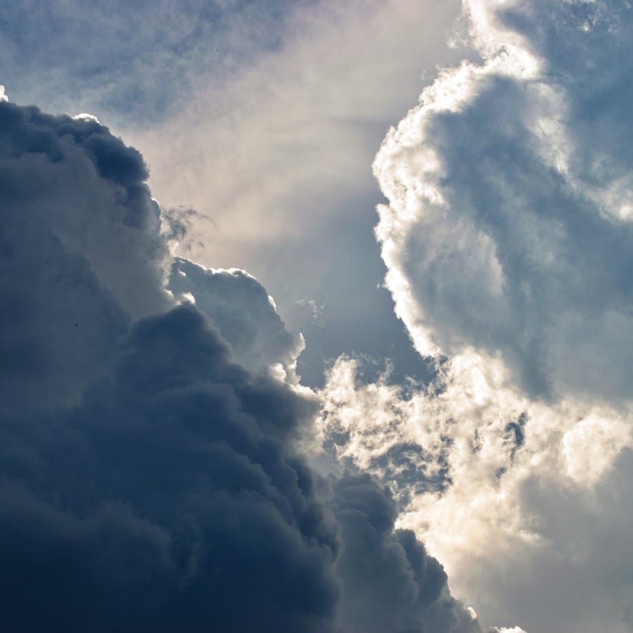 Close-up of a job search scene with a newspaper, red marker, and telephone, indicating job hunting.